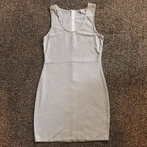 Bodycon style black and off white striped dress.